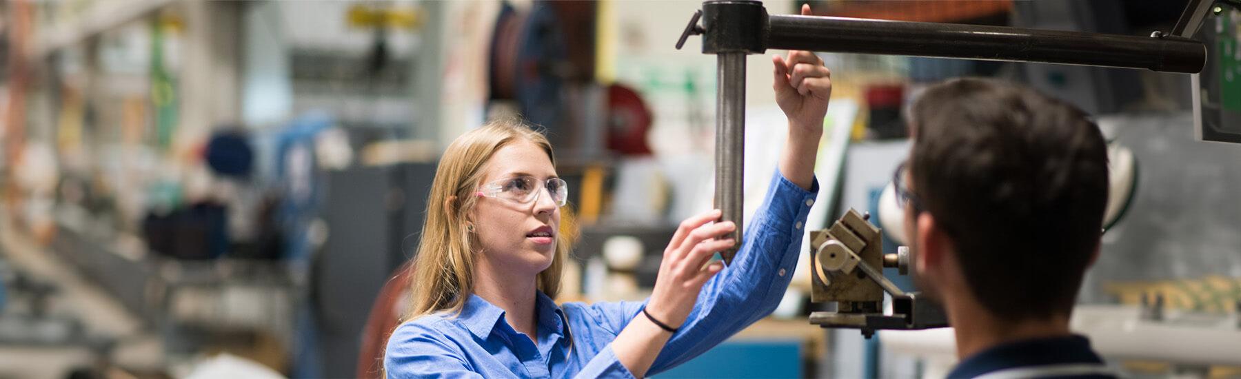 A person operating a machine