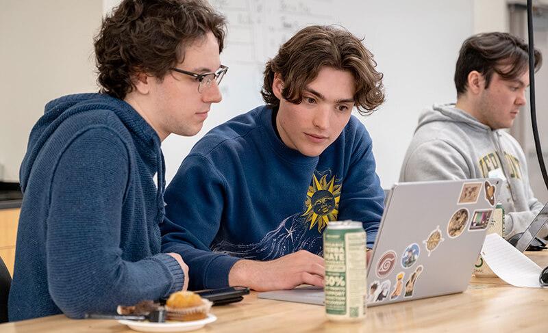 Students working together on a computer project