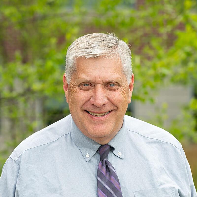 Headshot of Division Chief Dr. Holcombe