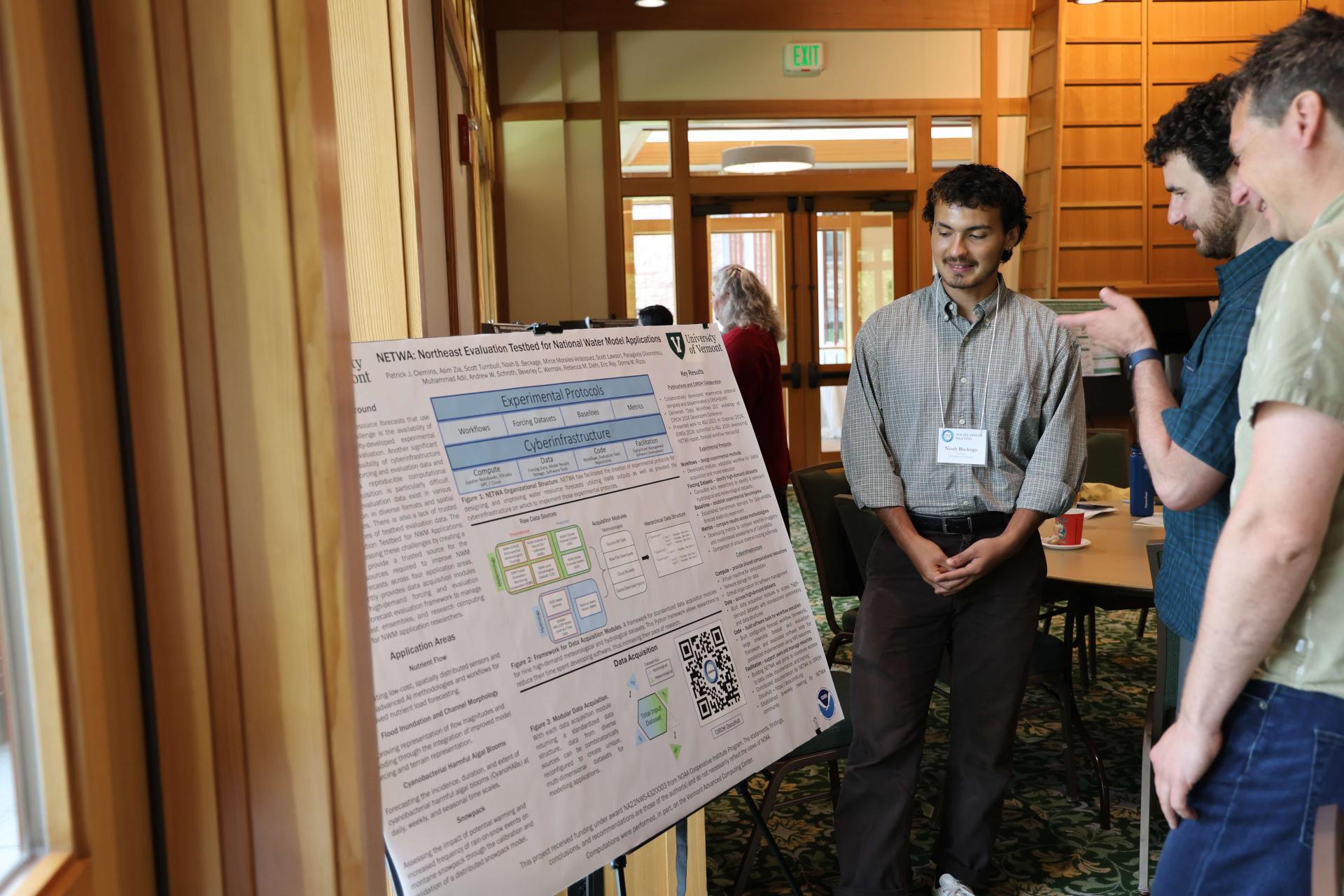Noah Beckage presenting poster