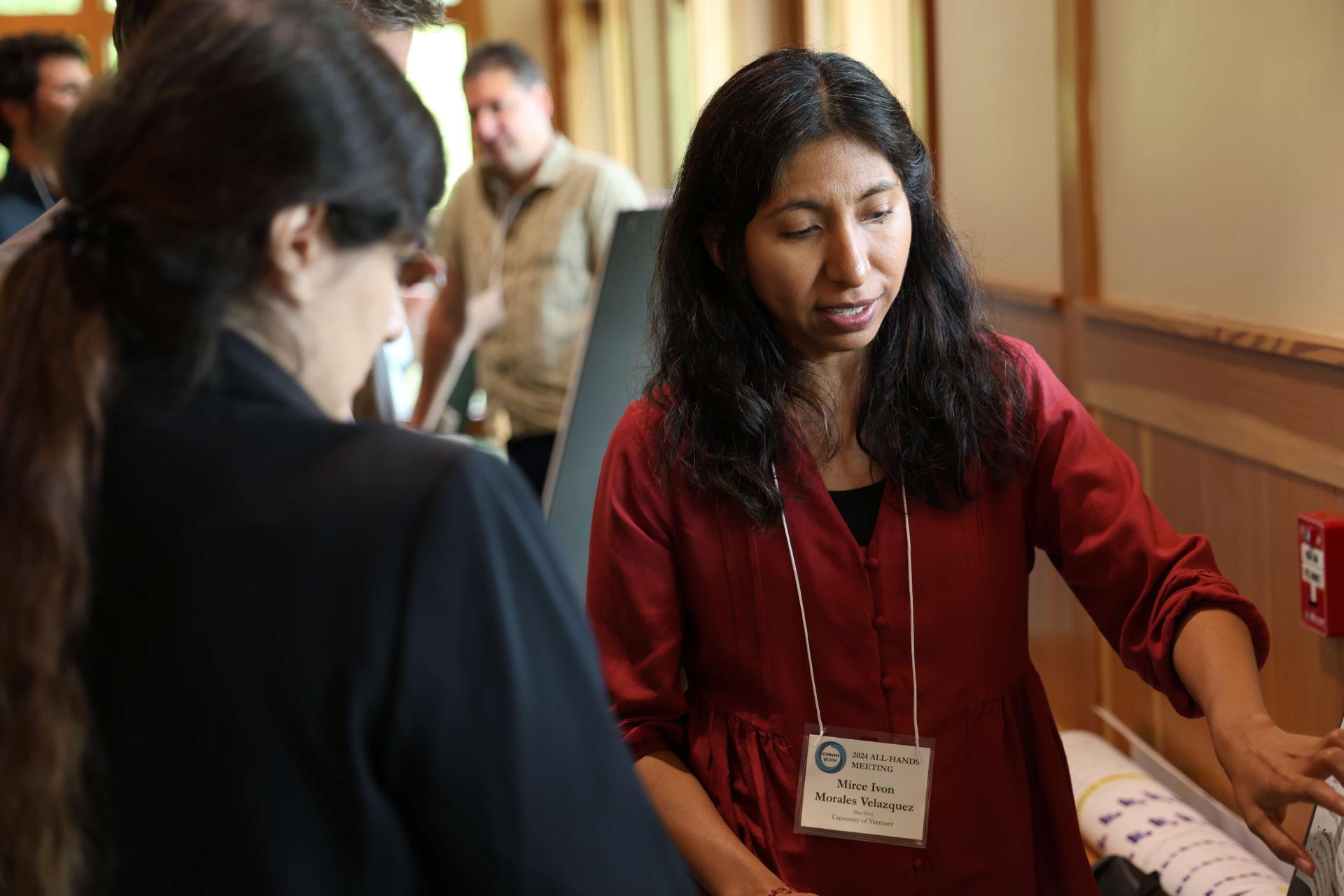 Mirce Morales-Velazquez presenting poster