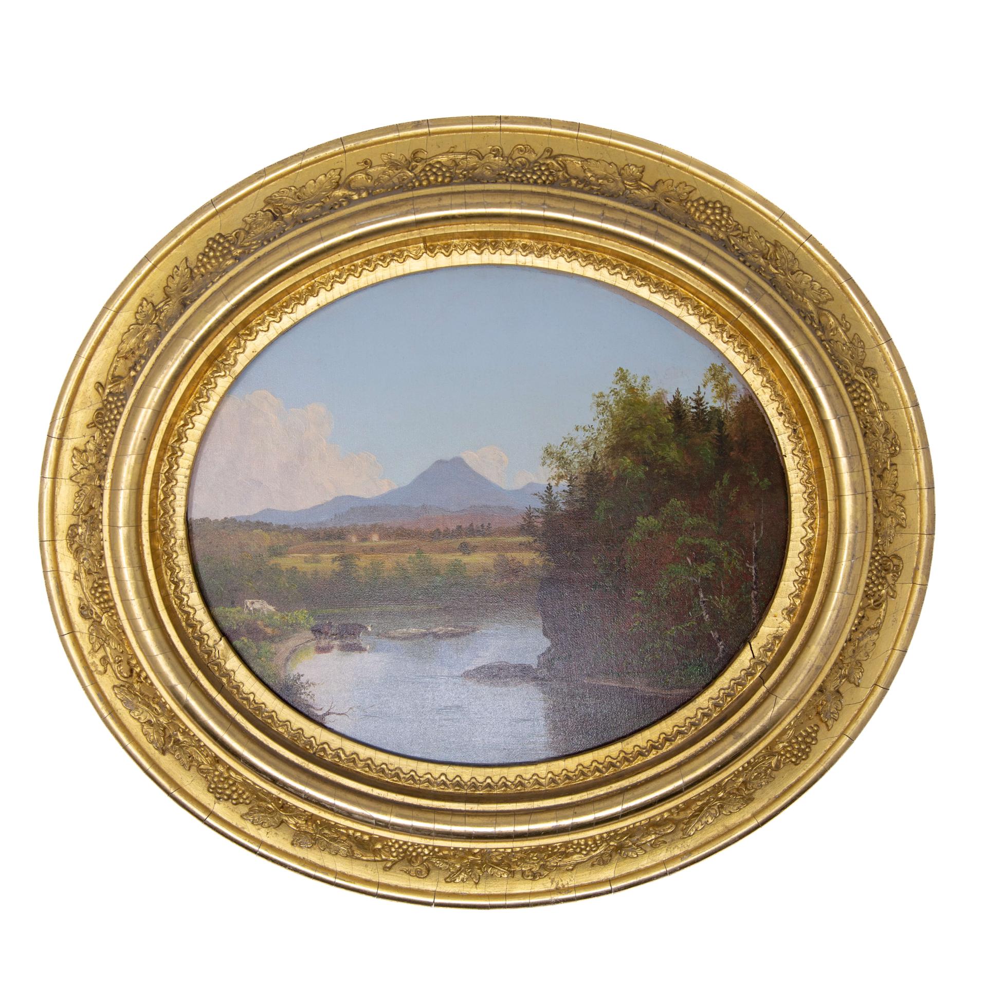Oval landscape painting in gold frame