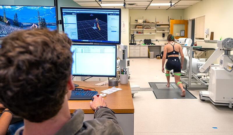 Using infrared retroreflective skin marker tracking technology, student researchers in the Musculoskeletal Imaging and Orthopaedic Biomechanics (MIOB) Laboratory optically capture the motion of a test subject.
