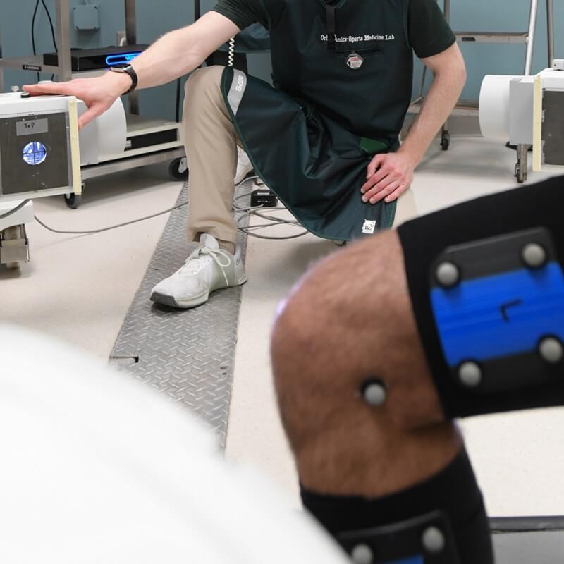 person takes xray images of a knee joint