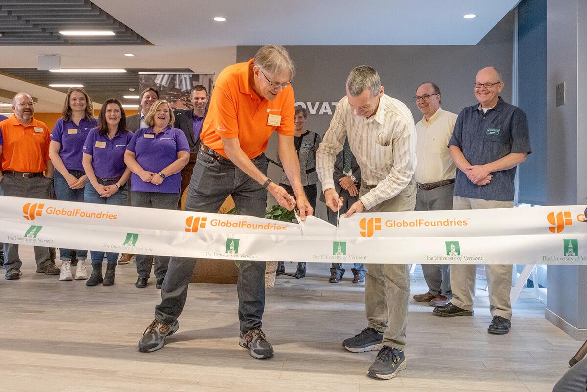 Woody Bowe from GlobalFoundries and Matt Gallagher, a Lecturer in the CEMS Electrical and Biomedical Engineering Department, share ribbon-cutting duties for ​​​​the opening of the new Device Characterization Teaching Lab which features scientific testing and failure analysis equipment donated by Essex Junction based semiconductor chip manufacturer.