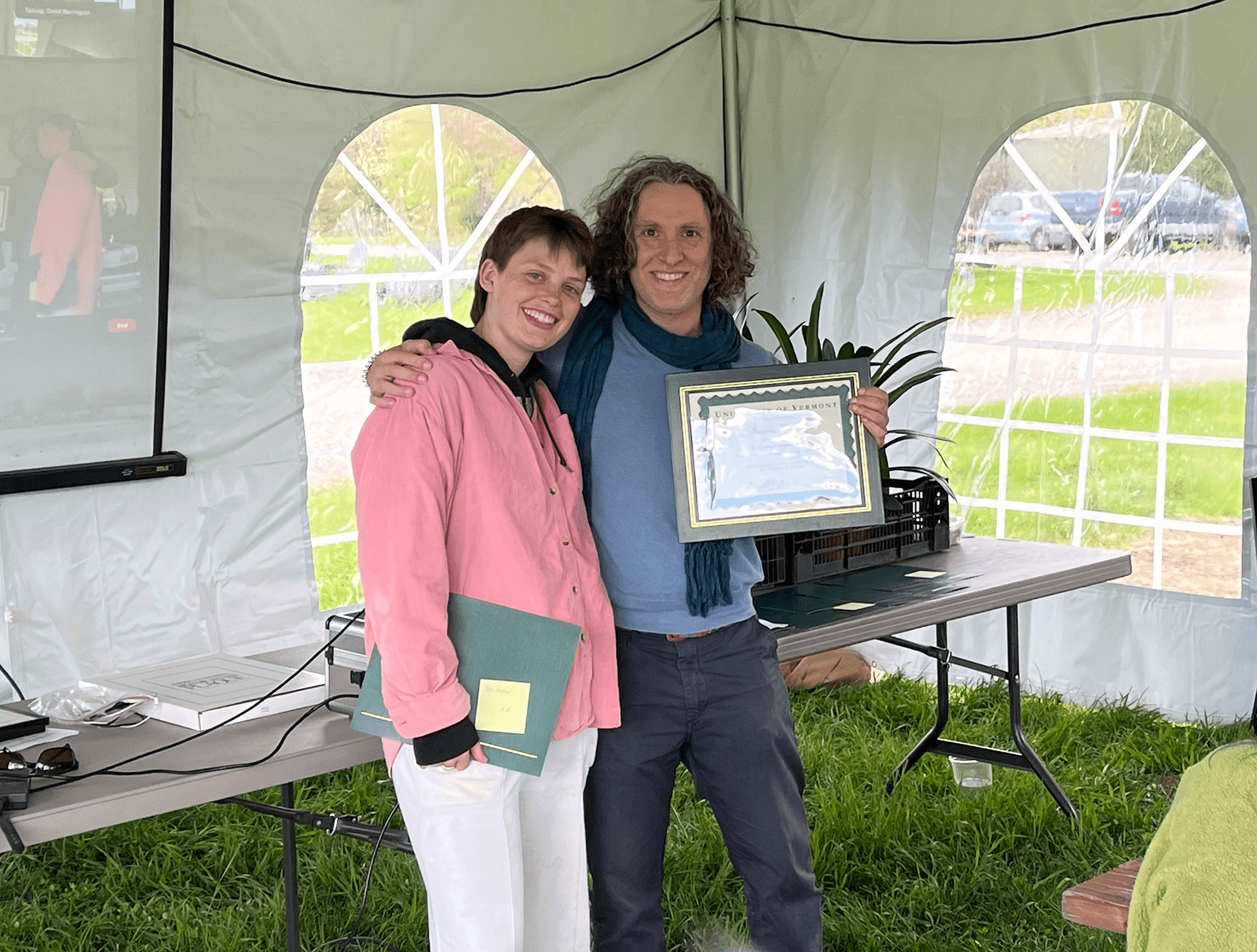 Faculty member presents award to student
