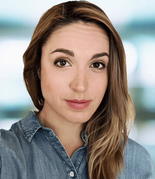 Headshot of the researcher with a blurred background.