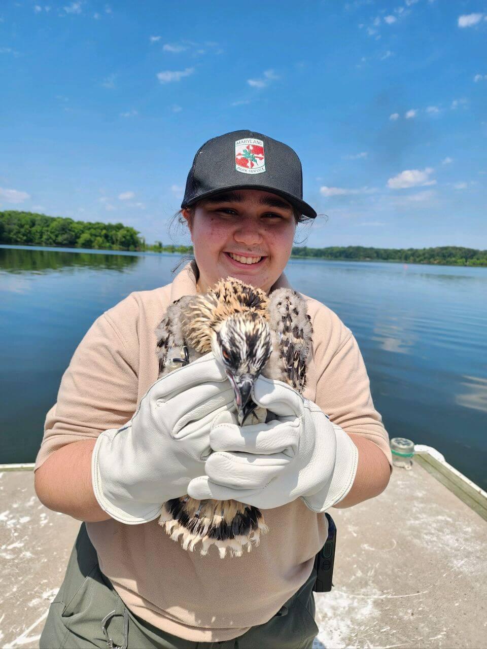 Sophia Carpenter submitted photo: Sophia holding baby osprey