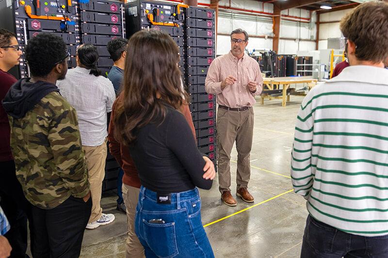 Graduate students learn about energy storage solutions being developed by Vermont-based KORE Power