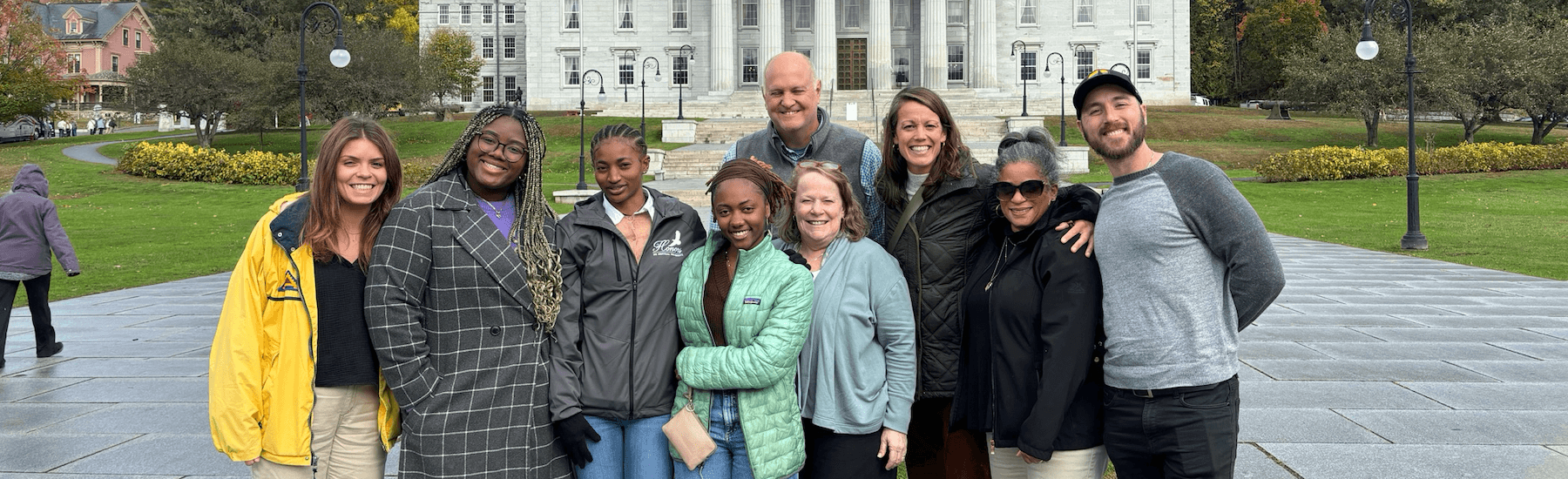 Community Schools stakeholders together in front of the Vermont Statehouse.