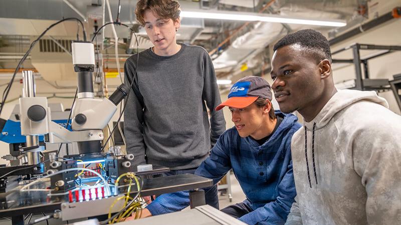 Students collaborate in the Device Characterization Lab