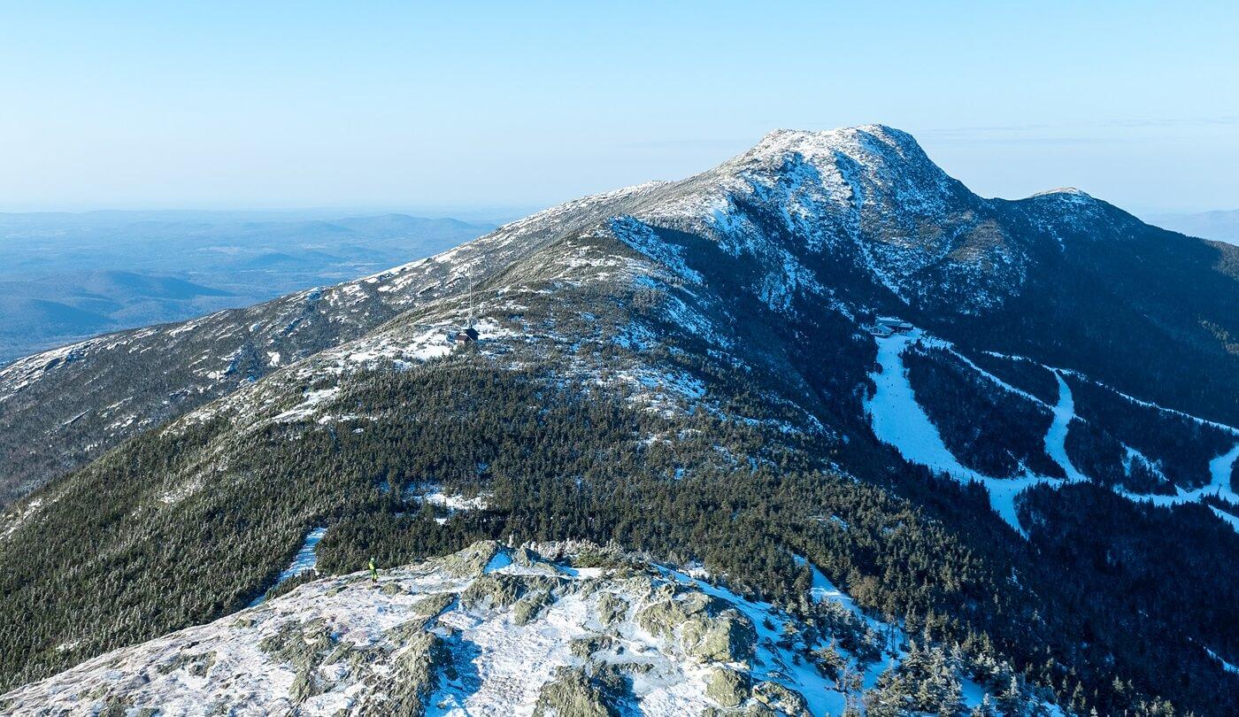 An aerial view of Mount Mansfield with snow on it, by Spatial Analysis Lab