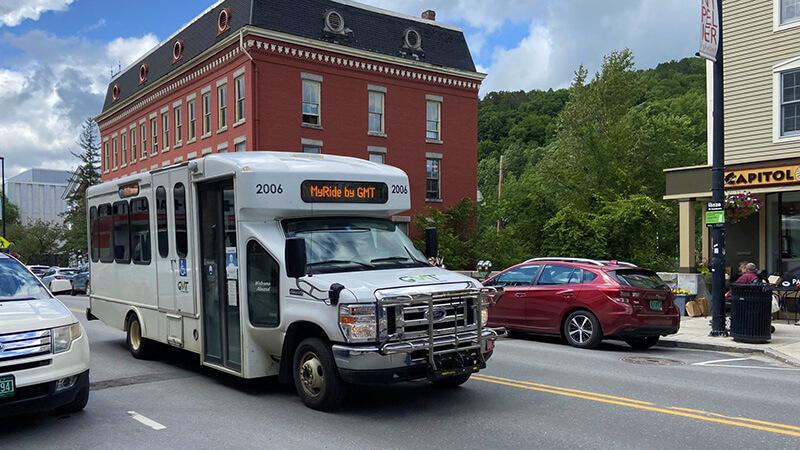 Transit van passing through a Vermont rural community