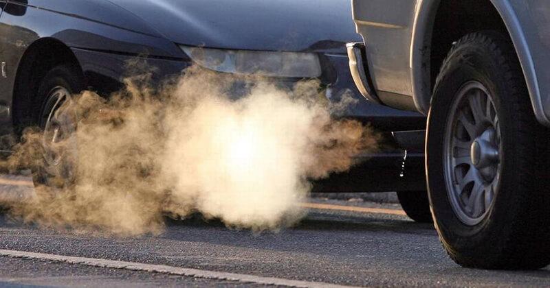 Image of car with exhaust cloud
