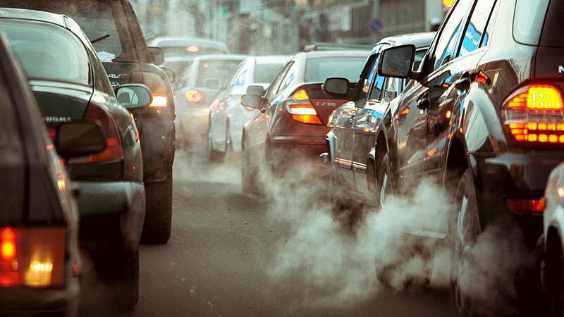 Car traffic with heavy exhaust