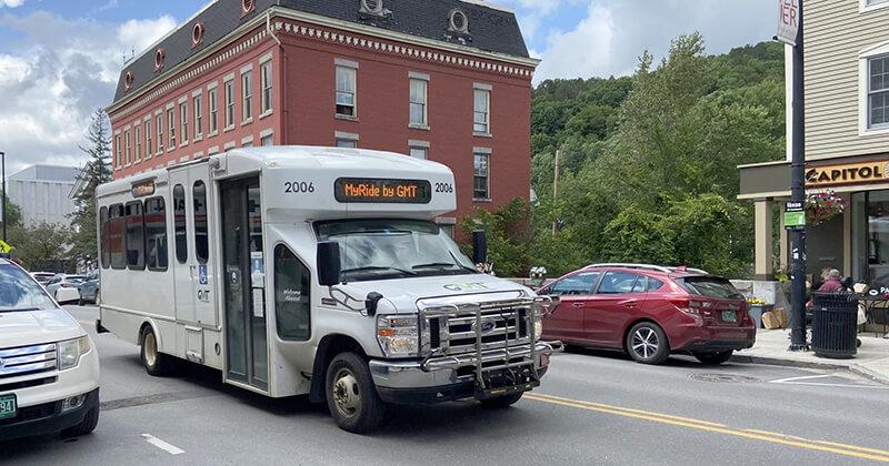 Small transit bus traveling in rural Vermont