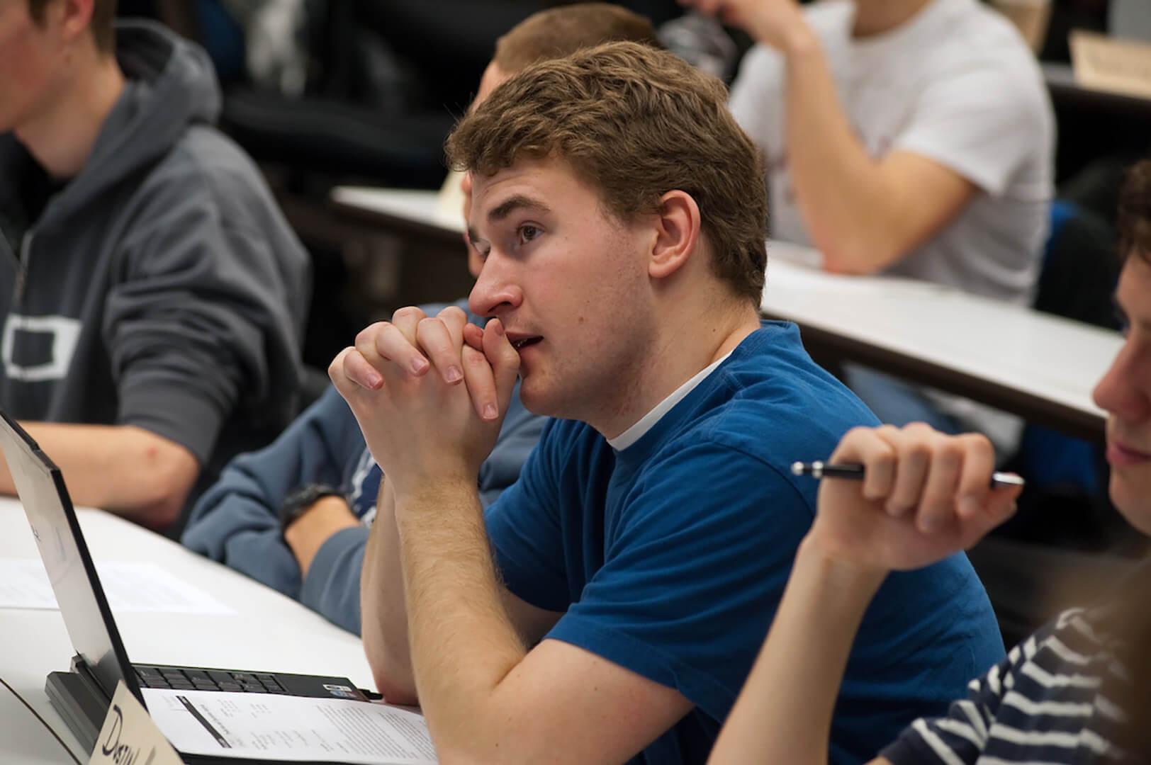 Student listening to a lecture in a class room