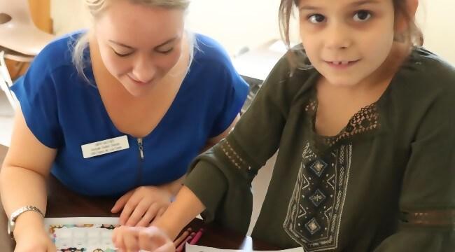 SLP student with client in Luse Center