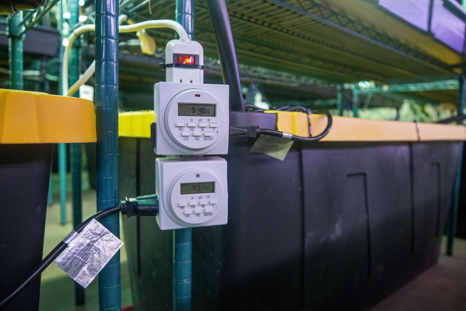 Timers connected to pumps for periodic irrigation.