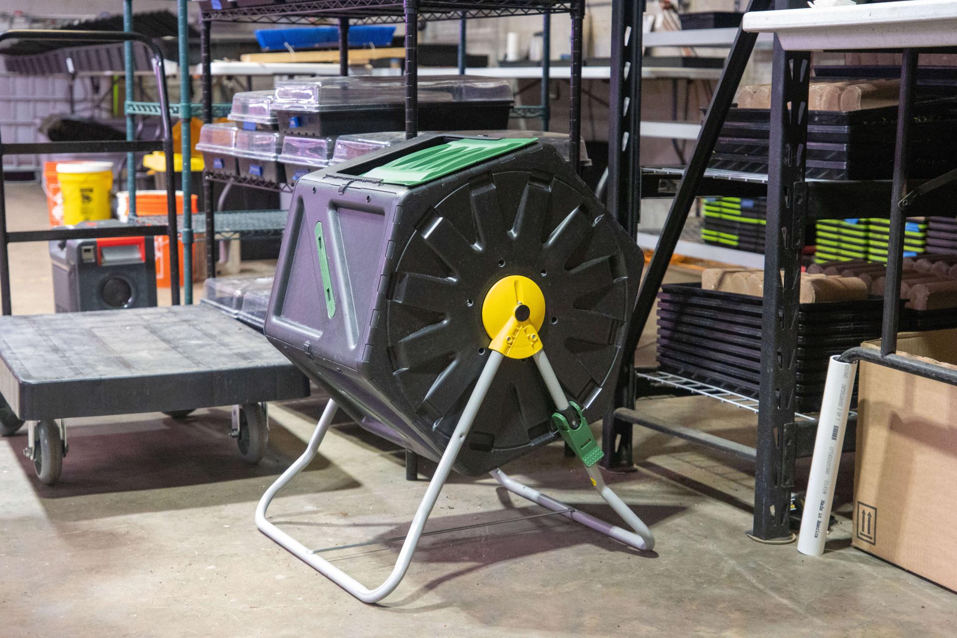 Compost tumbler that was repurposed as a mixer for combining varieties of microgreens.