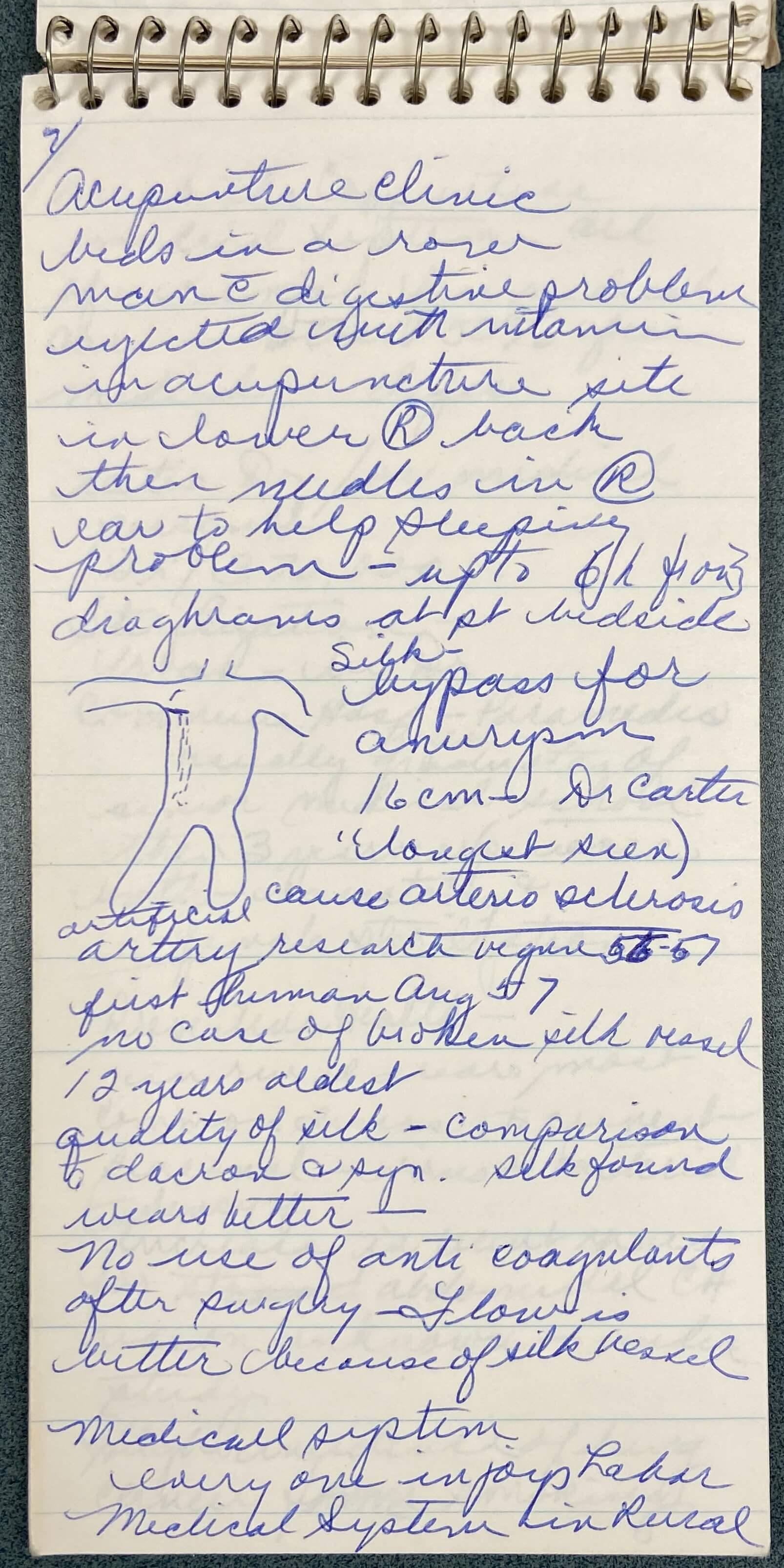 A page of notes in a small spiral notebook.