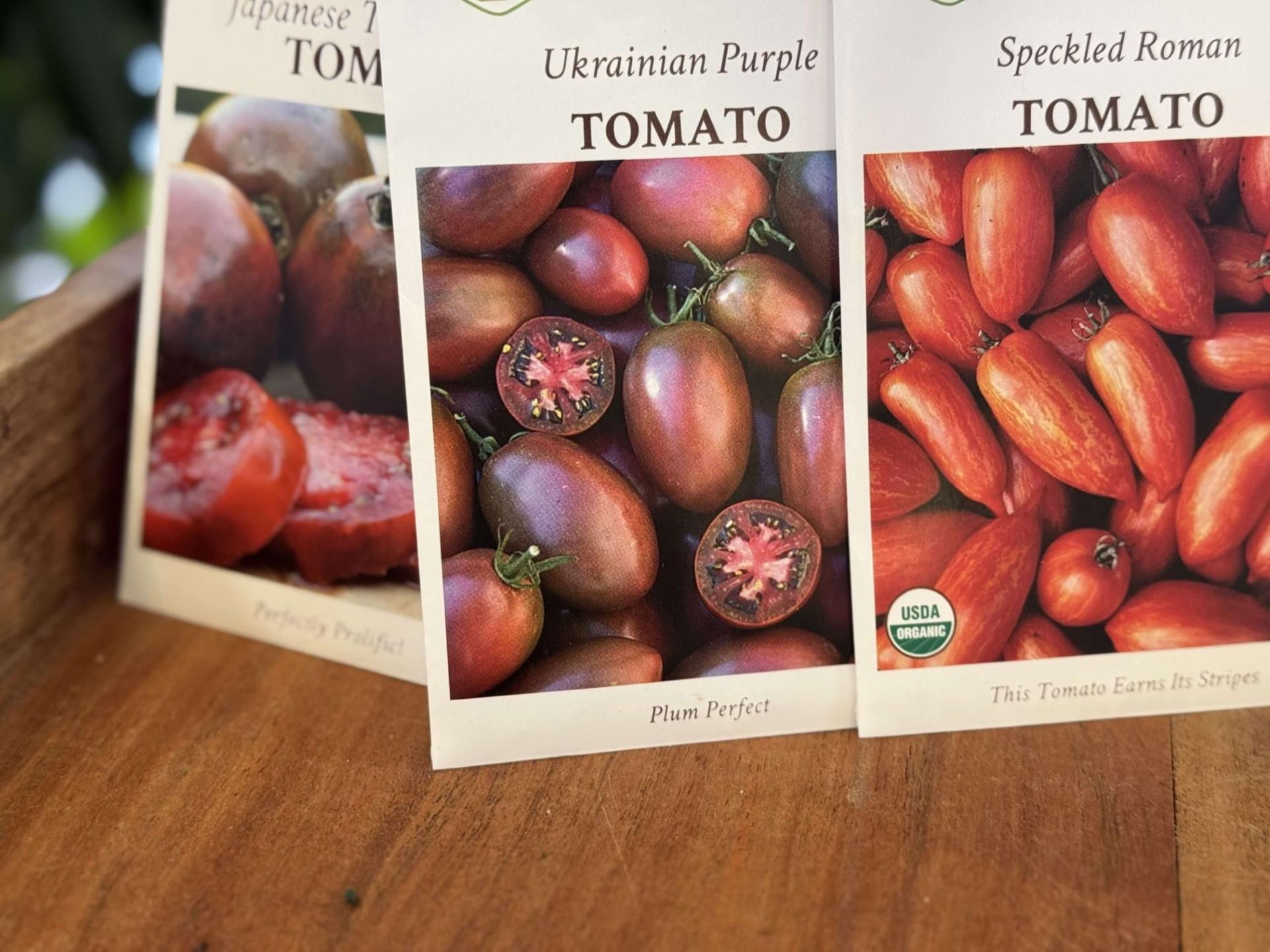 several tomato seed packets