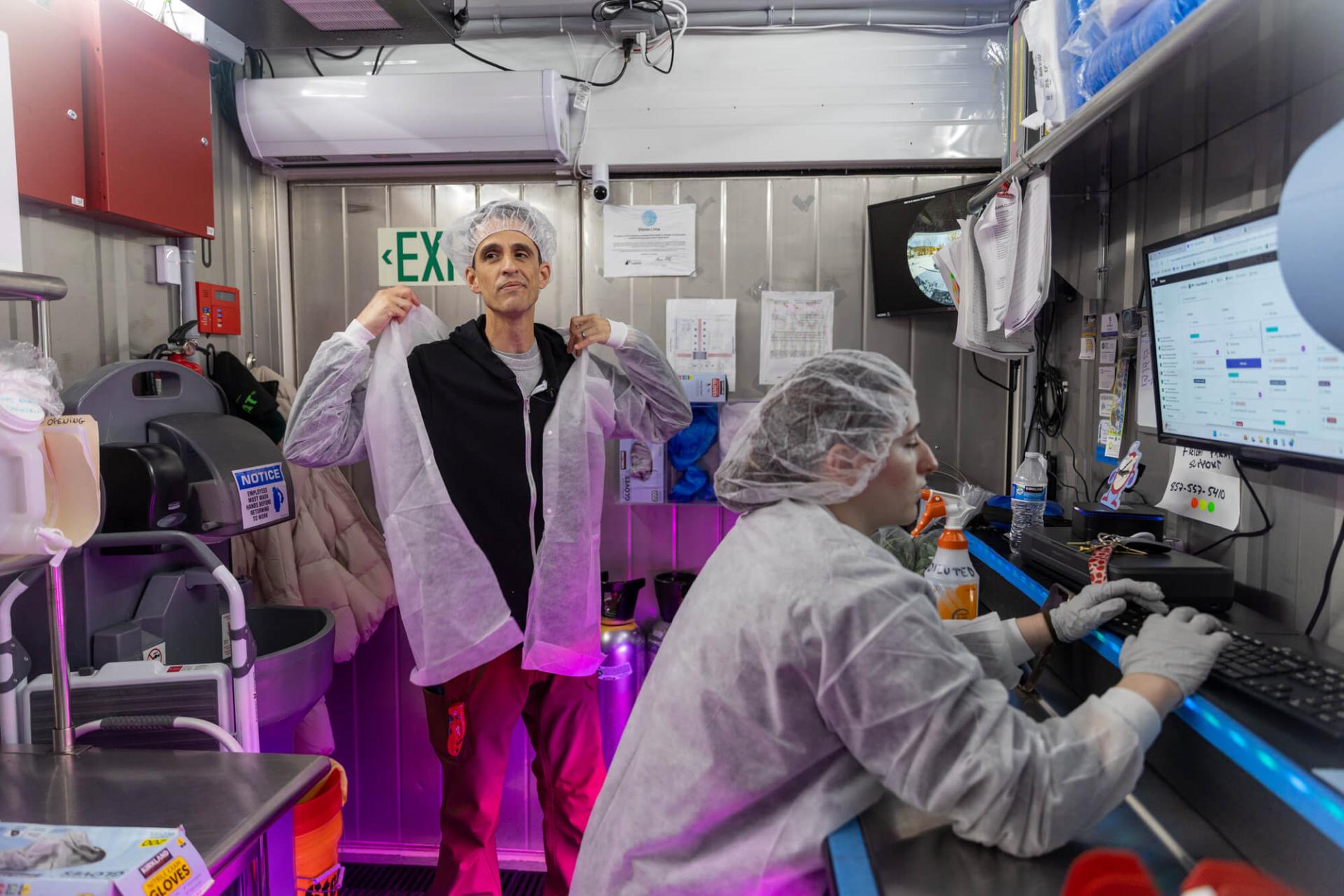 Donning PPE in container farm