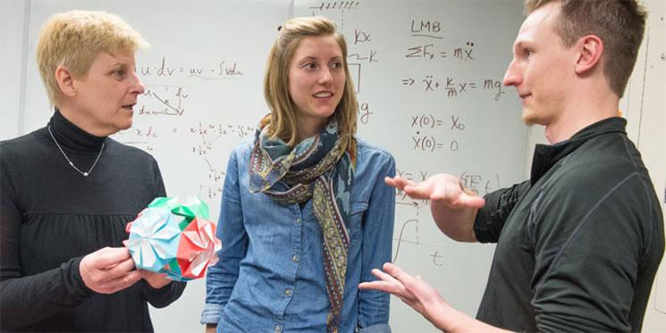 Student and faculty in a classroom