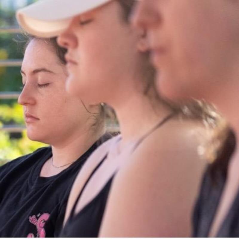 Student nurses practice meditation