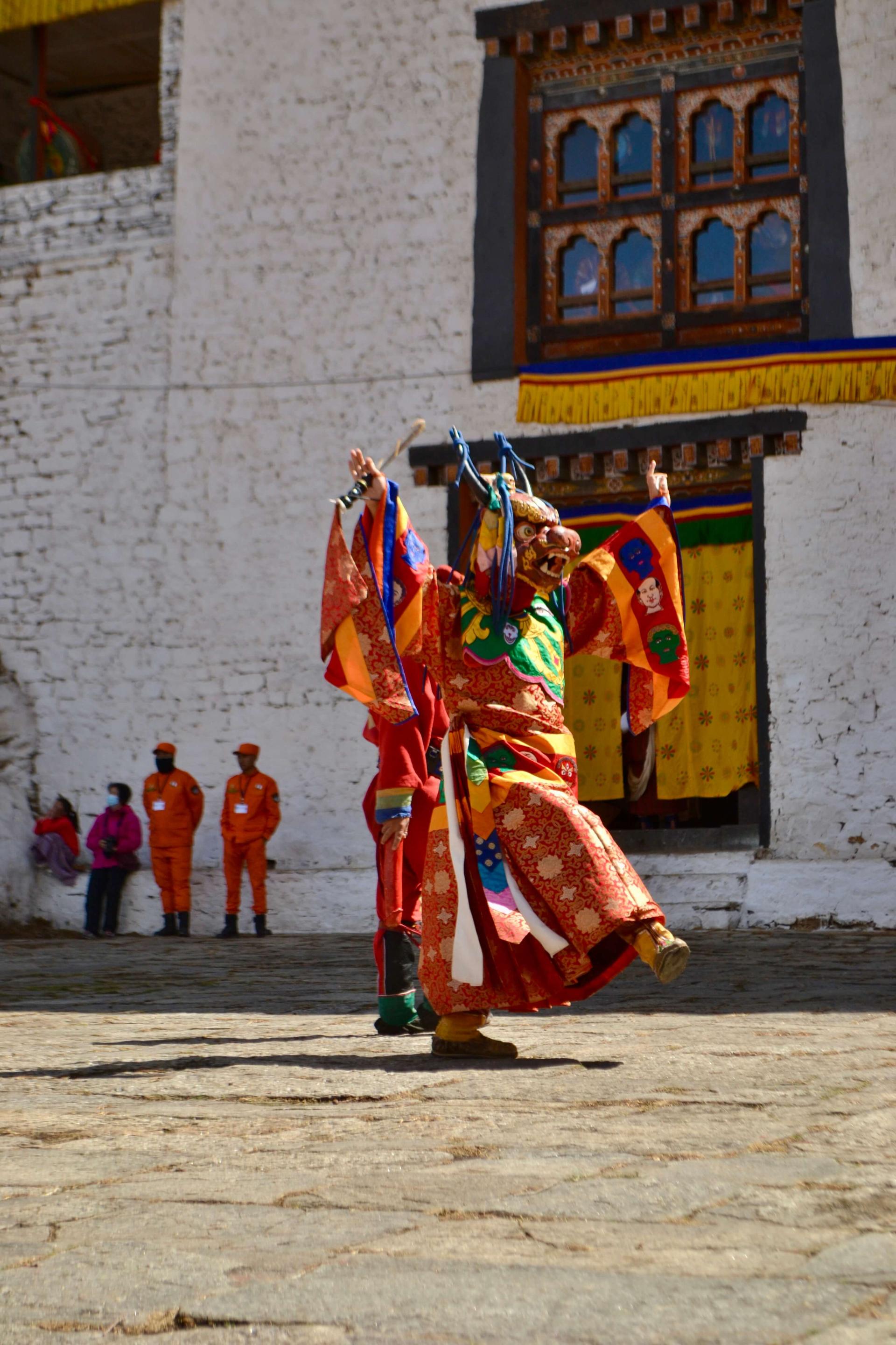 Dancer performing in Bhutan. Photo Credit: Annabel Resor
