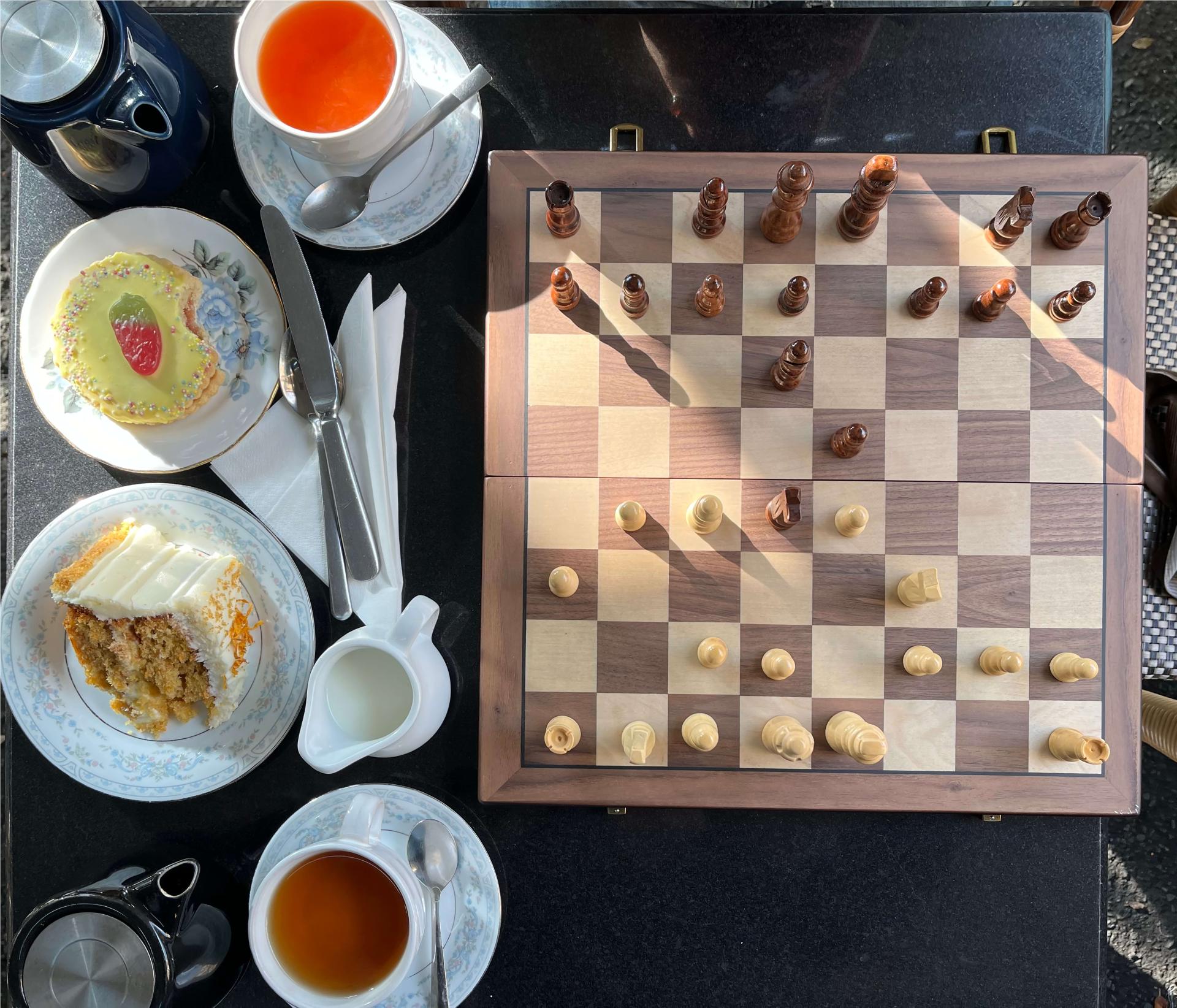 Afternoon tea with a chess board. Photo Credit: Bridget Goldberg
