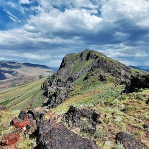 A mountainous ridge in the high desert, covered in sagebrush