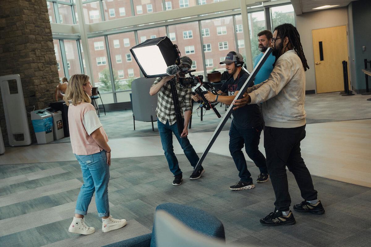 Group of people filming 