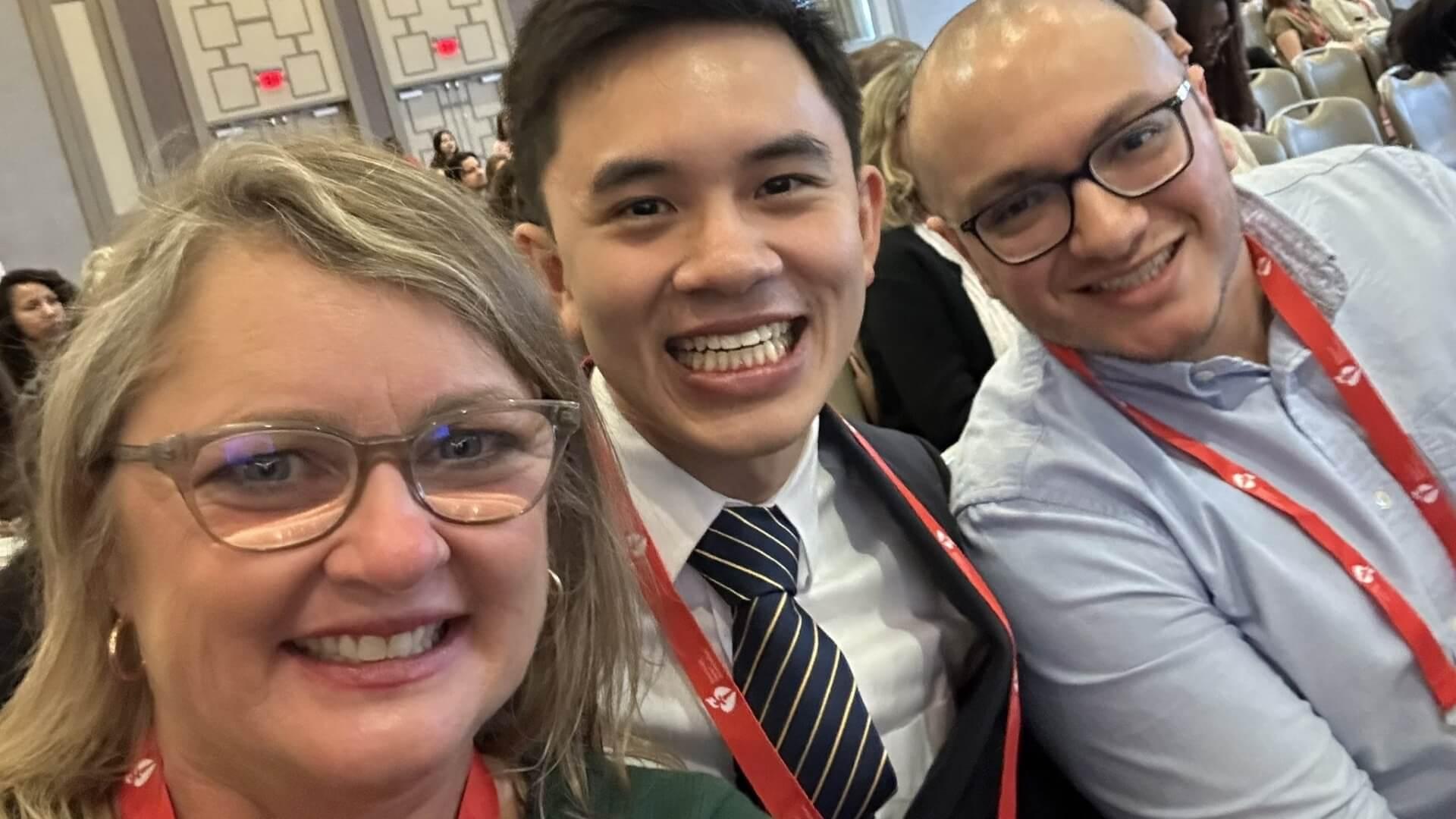 3 people at a conference