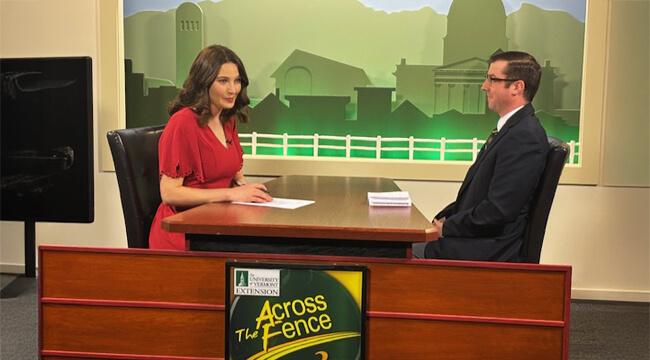 two people in a studio prepping for interview
