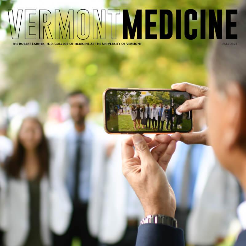 person taking a photo of med students