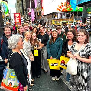 group of happy students in new york city