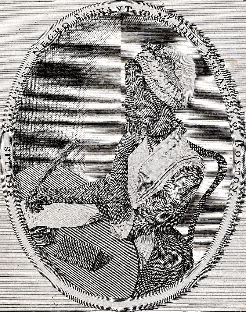 A black and white image of a woman writing with a feather pen.
