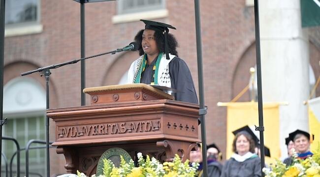 woman speaking at podium