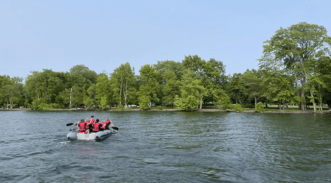 People in an inflatable boat on a river