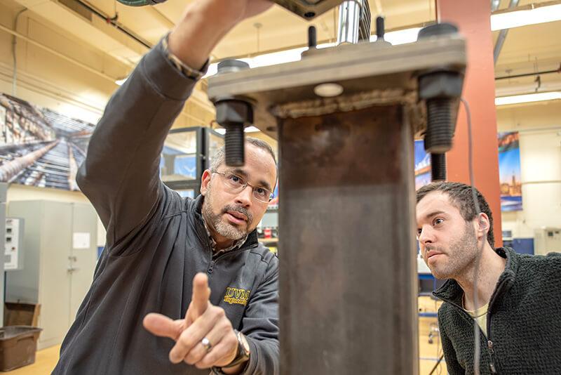 Professor Eric Hernandez demonstrates the capabilities of his lab
