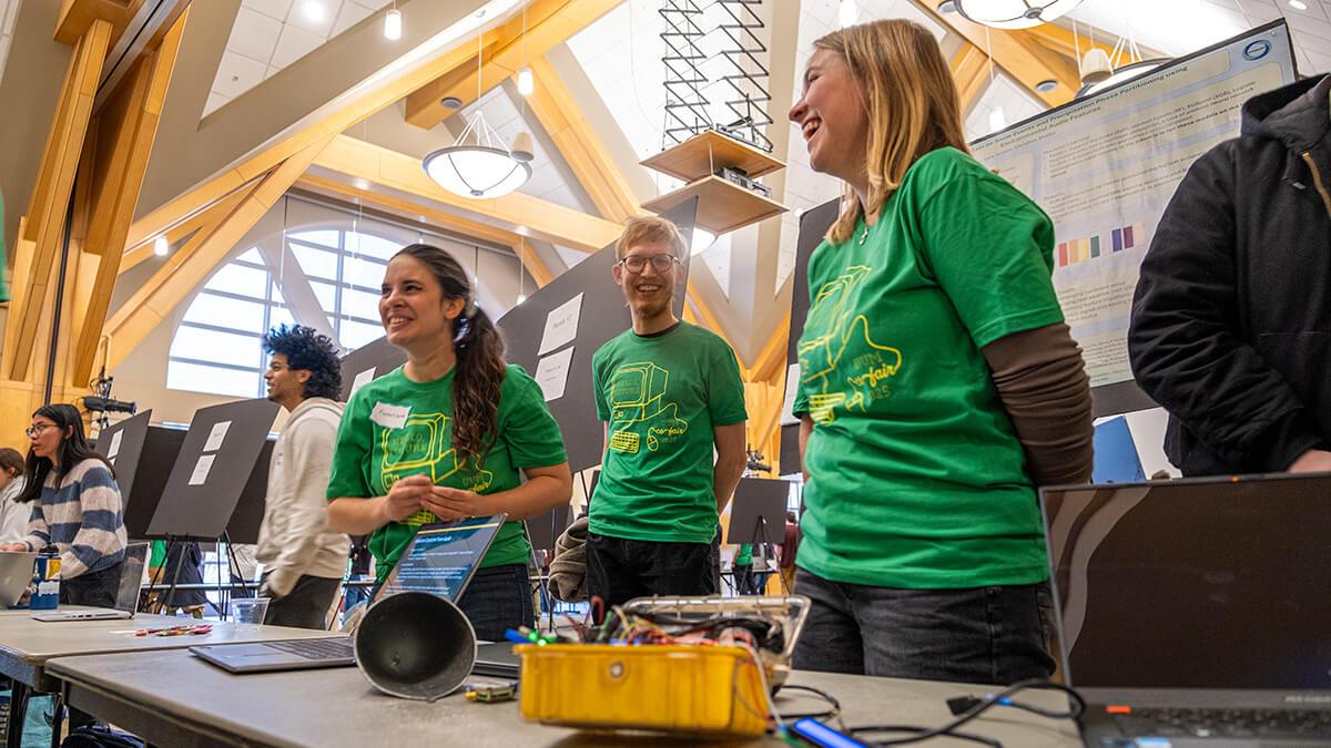 Student teams share their innovative projects during the 2024 Computer Science Fair in the Davis Center Grand Maple ballroom.