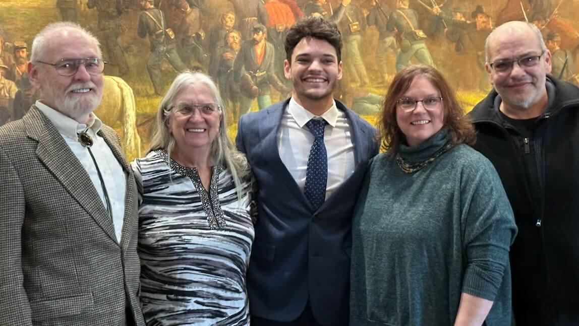 Public Communication Student with his family at the Vermont State House 