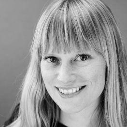 Black and white headshot of Dr. Staples