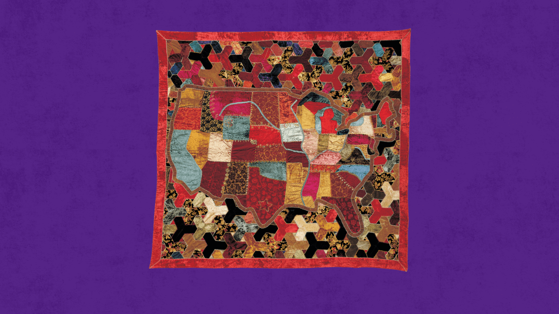 Various fabrics pieced together create a quilted map of the United States.