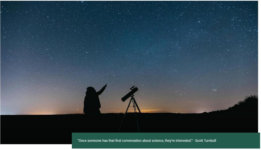 night sky with person at telescope