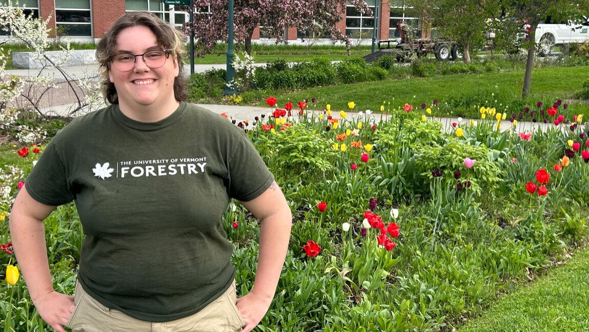 Erin Camire in front of UVM gardens.