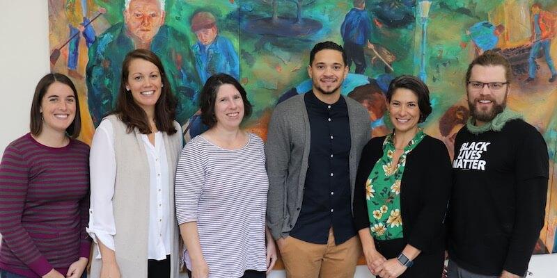 Members of UVM's restorative practices research team, from left to right: Mika Moore, Bernice Garnett, Colby Kervick, Quin Gonell, Tracy Ballysingh, and Lance Smith.