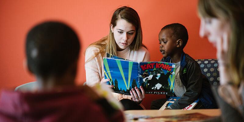Service-learning is key to the social work course. Medina Serdarevic, whose own parents left Bosnia as refugees, has worked in the King Street Center after school program spring semester. 